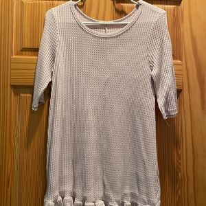 Women’s small light pink waffle knit tunic with ruffle bottom